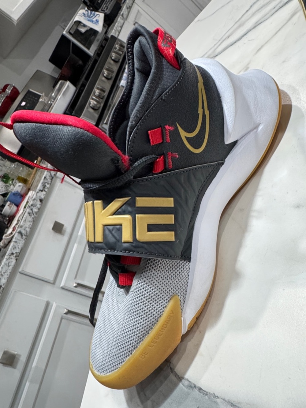 Nike Basketball Shoe in Black, White, Red & Gold Nike Future Court